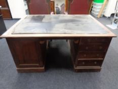 A 19th century mahogany partner's desk,
