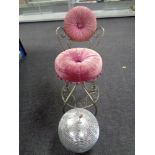A metal dressing table chair upholstered in a pink dralon together with a glitter ball
