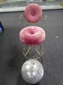 A metal dressing table chair upholstered in a pink dralon together with a glitter ball