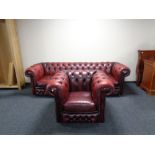 A red button leather Chesterfield club settee and armchair