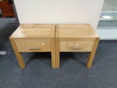 A pair of contemporary oak lamp tables fitted a drawer