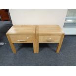 A pair of contemporary oak lamp tables fitted a drawer