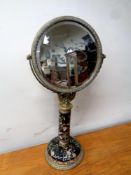 A fine continental brass hand painted vanity mirror,