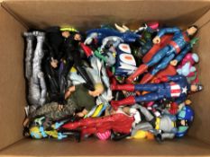 A box containing contemporary action figures, Action Man,