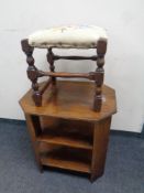 A 20th century oak octagonal three tier book table together with a beech wood tapestry upholstered