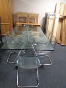 Lord Norman Foster for Tecno, a 'Nomos' glass and chrome dining table, length 180 cm,