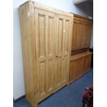 An antique pine double door hall wardrobe, height 208 cm,