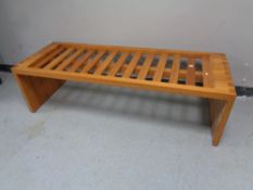 A 20th century teak coffee table (missing glass panel),