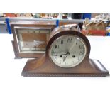 An Art Deco oak eight day mantel clock together with a further dome top mantel clock