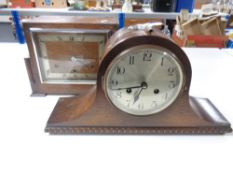 An Art Deco oak eight day mantel clock together with a further dome top mantel clock