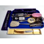 A tray containing dressing table brushes and hand mirrors,