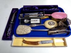A tray containing dressing table brushes and hand mirrors,