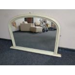 A contemporary overmantel mirror