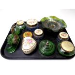 A tray containing green glass dressing table bottles, atomiser, two petrol glass bowls,