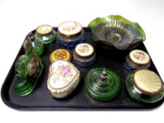 A tray containing green glass dressing table bottles, atomiser, two petrol glass bowls,