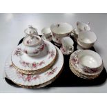 A tray containing 23 pieces of Royal Albert Lavender Rose tea and dinner china