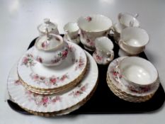 A tray containing 23 pieces of Royal Albert Lavender Rose tea and dinner china