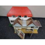 Two mid 20th century dolls houses and a small quantity of furniture