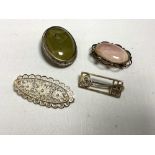 Four vintage silver brooches