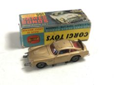 A Corgi Toys 261 James Bond Aston Martin DB5 with figures and original box (as found)