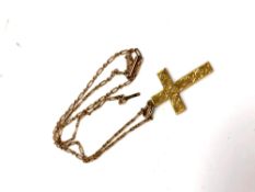 A 9ct gold crucifix pendant on a 9ct gold chain, 3.