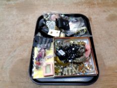 A tray containing a quantity of costume jewellery