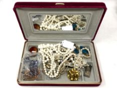 A box of costume jewellery, necklaces,