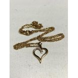 A 9ct gold pendant on chain 1.6g.