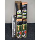Two boxed Flymo electric hedge cutters together with a Bush cordless stick vacuum (boxed)