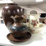 A pottery wash jug and basin together with a pottery vase,