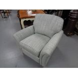 A Parker Knoll "Devonshire" armchair with power footrest,