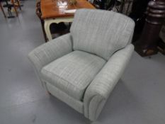 A Parker Knoll "Devonshire" armchair with power footrest,