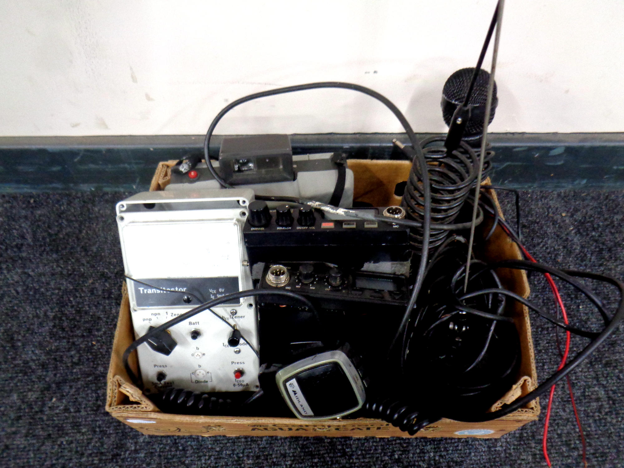 A box of Midland CB radio transceivers, hand set, microphone,