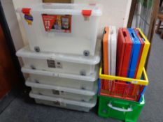 A quantity of plastic storage boxes and crates