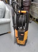 A Vax Power 3 2500 pressure washer with hose