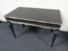 A French style painted coffee table on tapered legs,