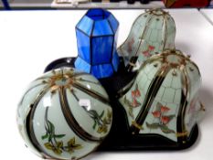 A tray containing blue mottled glass light shade together with three further Art Nouveau style