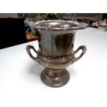 A silver plated twin handled wine cooler