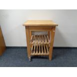 A pine kitchen butcher's block trolley