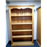 A set of pine open bookshelves, width 125 cm including cornice,