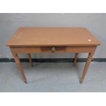 An antique painted side table fitted a drawer,