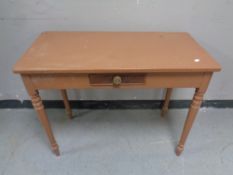 An antique painted side table fitted a drawer,
