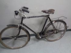 A vintage gent's Raleigh humber bike with a leather Brooks saddle