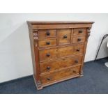 A Victorian style pine eight drawer chest, height 132 cm,