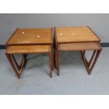 Two nests of two mid 20th century teak G Plan tables