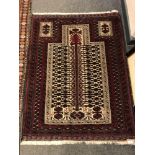 An Afghan prayer rug 131 x 100 cm