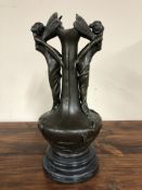 An Art Nouveau style bronze vase on black marble base, height 39.