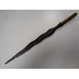 An antique brass handled spearhead, length 52.