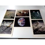 Twelve vintage NASA lithographs of Neil Armstrong and Buzz Aldrin on the moon,