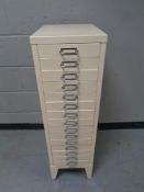 A fifteen drawer metal index chest (painted)